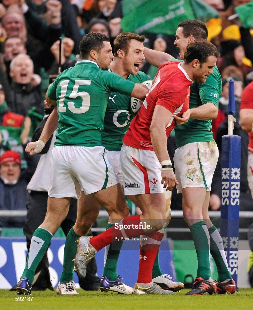 5 February 2012; Tommy Bowe, Ireland, celebrates with team mates Rob Kearney and Jonathan Sexton after scoring his side's second try. RBS Six Nations Rugby Championship, Ireland v Wales, Aviva Stadium, Lansdowne Road, Dublin. Picture credit: Brian Lawless / SPORTSFILE