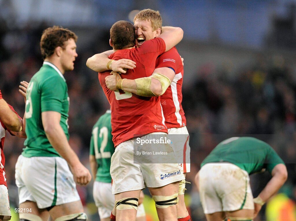 5 February 2012; Bradley Davies and Ian Evans, 5, celebrate after the final whistle, Wales. RBS Six Nations Rugby Championship, Ireland v Wales, Aviva Stadium, Lansdowne Road, Dublin. Picture credit: Brian Lawless / SPORTSFILE
