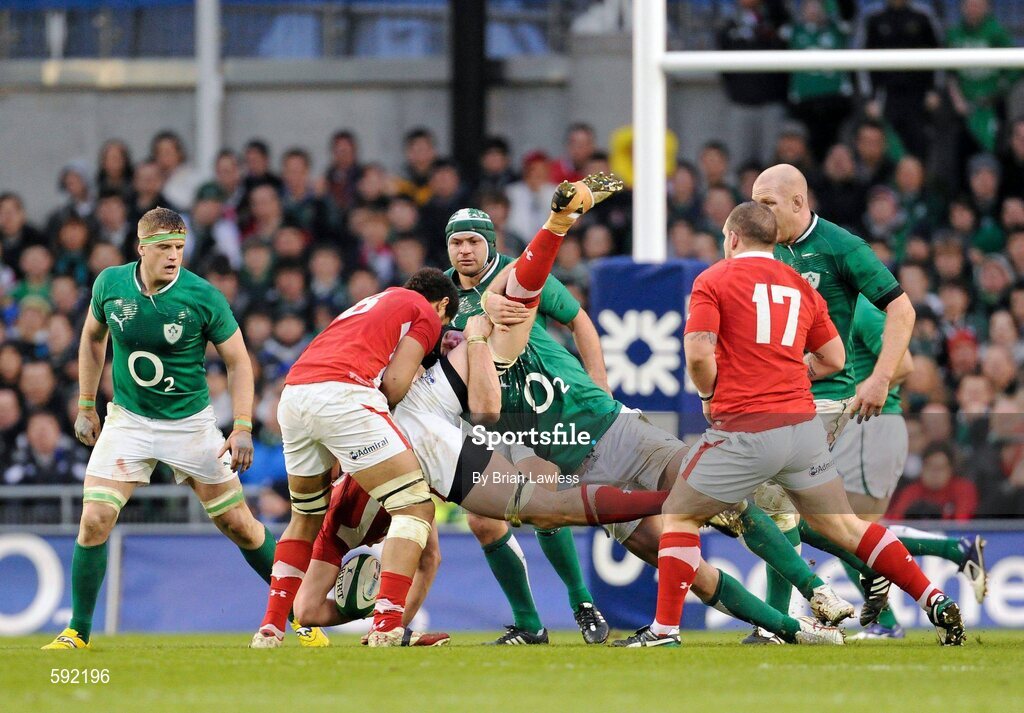 5 February 2012; Stephen Ferris, Ireland, tackles Ian Evans, Wales, which resulted in a penalty for Wales. RBS Six Nations Rugby Championship, Ireland v Wales, Aviva Stadium, Lansdowne Road, Dublin. Picture credit: Brian Lawless / SPORTSFILE