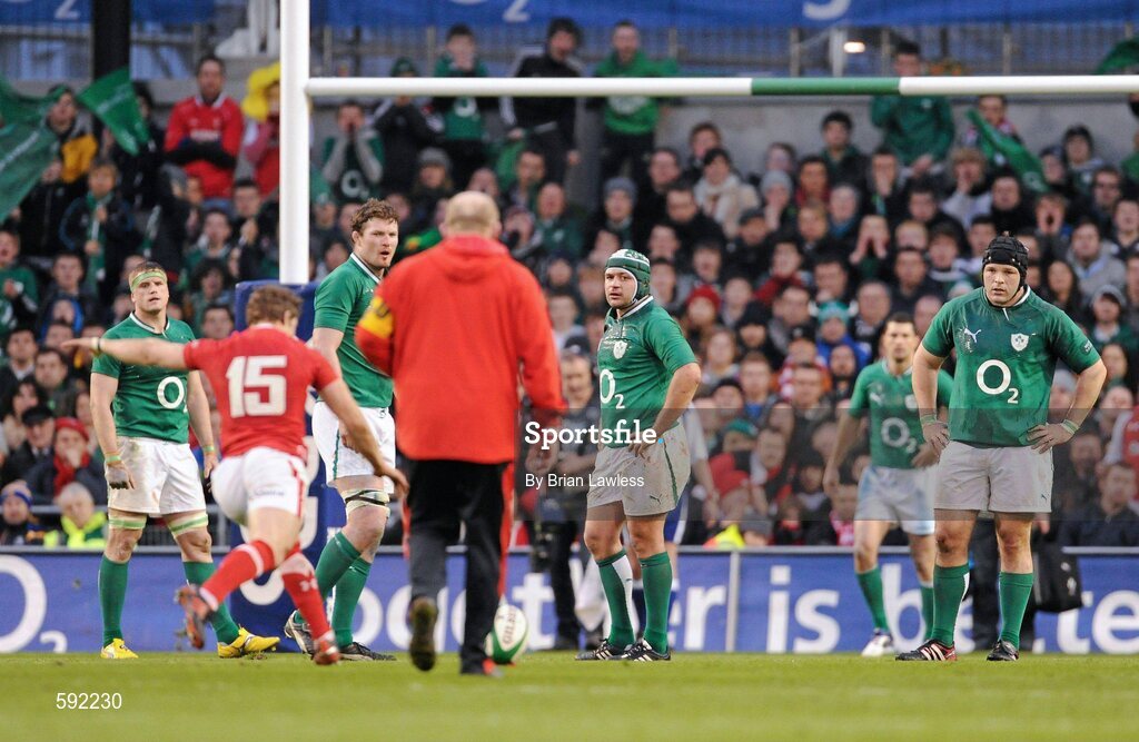 5 February 2012; Ireland players, from left, Jamie Heaslip, Donnacha Ryan, Rory Best and Mike Ross look on as Leigh Halfpenny, Wales, kicks a late penalty to win the match. RBS Six Nations Rugby Championship, Ireland v Wales, Aviva Stadium, Lansdowne Road, Dublin. Picture credit: Brian Lawless / SPORTSFILE