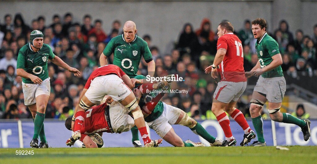 5 February 2012; Stephen Ferris, Ireland, tackles Ian Evans, Wales, for which he received a yellow card from referee Wayne Barnes. RBS Six Nations Rugby Championship, Ireland v Wales, Aviva Stadium, Lansdowne Road, Dublin. Picture credit: Stephen McCarthy / SPORTSFILE