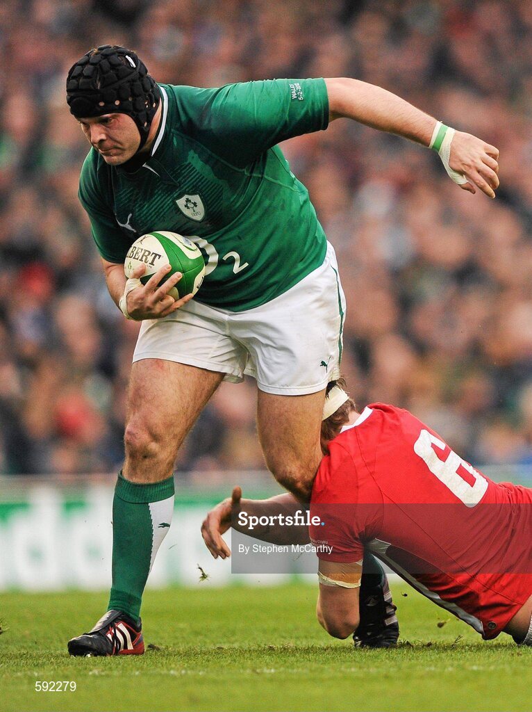 5 February 2012; Mike Ross, Ireland, is tackled by Ryan Jones, Wales. RBS Six Nations Rugby Championship, Ireland v Wales, Aviva Stadium, Lansdowne Road, Dublin. Picture credit: Stephen McCarthy / SPORTSFILE
