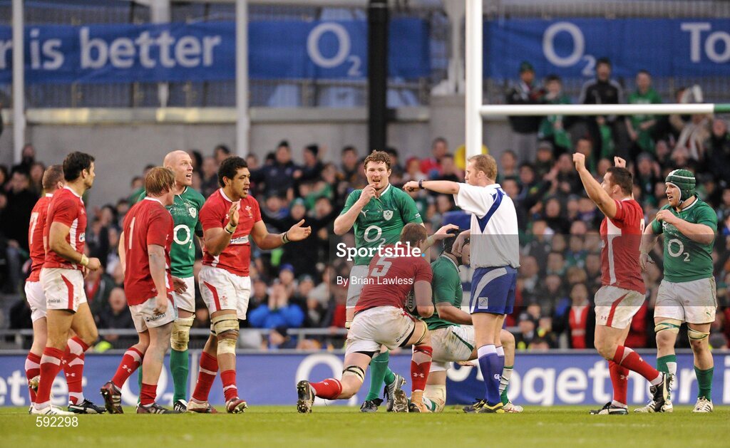 5 February 2012; Referee Wayne Barnes signals for a late penalty for Wales as Ireland players, from left, Paul O'Connell, Donnacha Ryan and Sean O'Brien look on. RBS Six Nations Rugby Championship, Ireland v Wales, Aviva Stadium, Lansdowne Road, Dublin. Picture credit: Brian Lawless / SPORTSFILE