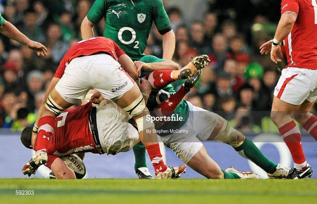 5 February 2012; Stephen Ferris, Ireland, tackles Ian Evans, Wales, for which he received a yellow card from referee Wayne Barnes. RBS Six Nations Rugby Championship, Ireland v Wales, Aviva Stadium, Lansdowne Road, Dublin. Picture credit: Stephen McCarthy / SPORTSFILE