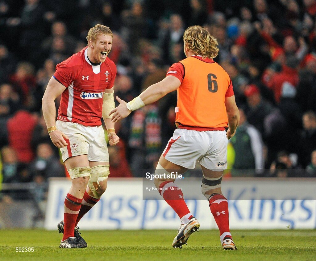 5 February 2012; Wales players Bradley Davis and substitute Andy Powell celebrate after the game. RBS Six Nations Rugby Championship, Ireland v Wales, Aviva Stadium, Lansdowne Road, Dublin. Picture credit: Brendan Moran / SPORTSFILE