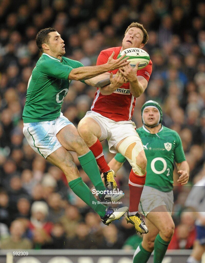5 February 2012; Rob Kearney, Ireland, contests a high ball with Rhys Priestland, Wales. RBS Six Nations Rugby Championship, Ireland v Wales, Aviva Stadium, Lansdowne Road, Dublin. Picture credit: Brendan Moran / SPORTSFILE