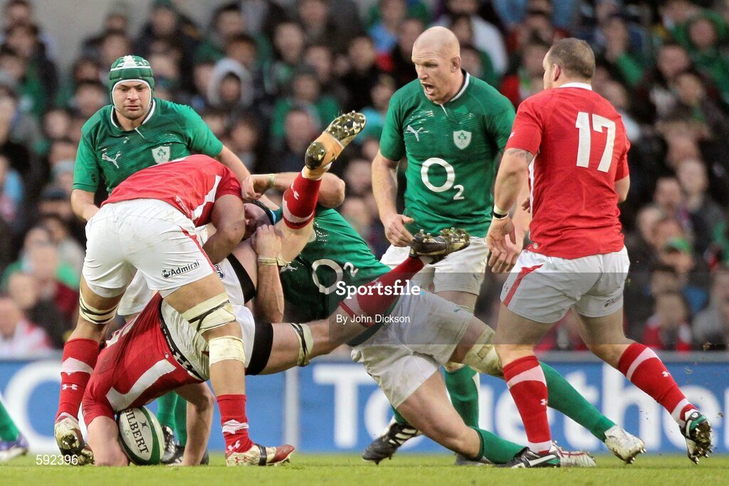 5 February 2012; Stephen Ferris, Ireland, tackles Ian Evans, Wales, for which he received a yellow card from referee Wayne Barnes. RBS Six Nations Rugby Championship, Ireland v Wales, Aviva Stadium, Lansdowne Road, Dublin. Picture credit: John Dickson / SPORTSFILE