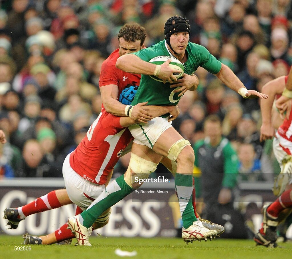 5 February 2012; Stephen Ferris, Ireland, is tackled by Justin Tipuric and Jamie Roberts, Wales. RBS Six Nations Rugby Championship, Ireland v Wales, Aviva Stadium, Lansdowne Road, Dublin. Picture credit: Brendan Moran / SPORTSFILE