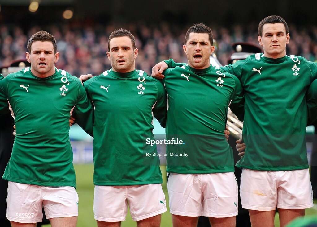 5 February 2012; Ireland players, from left, Fergus McFadden, David Kearney, Rob Kearney and Jonathan Sexton during the National Anthems. RBS Six Nations Rugby Championship, Ireland v Wales, Aviva Stadium, Lansdowne Road, Dublin. Picture credit: Stephen McCarthy / SPORTSFILE