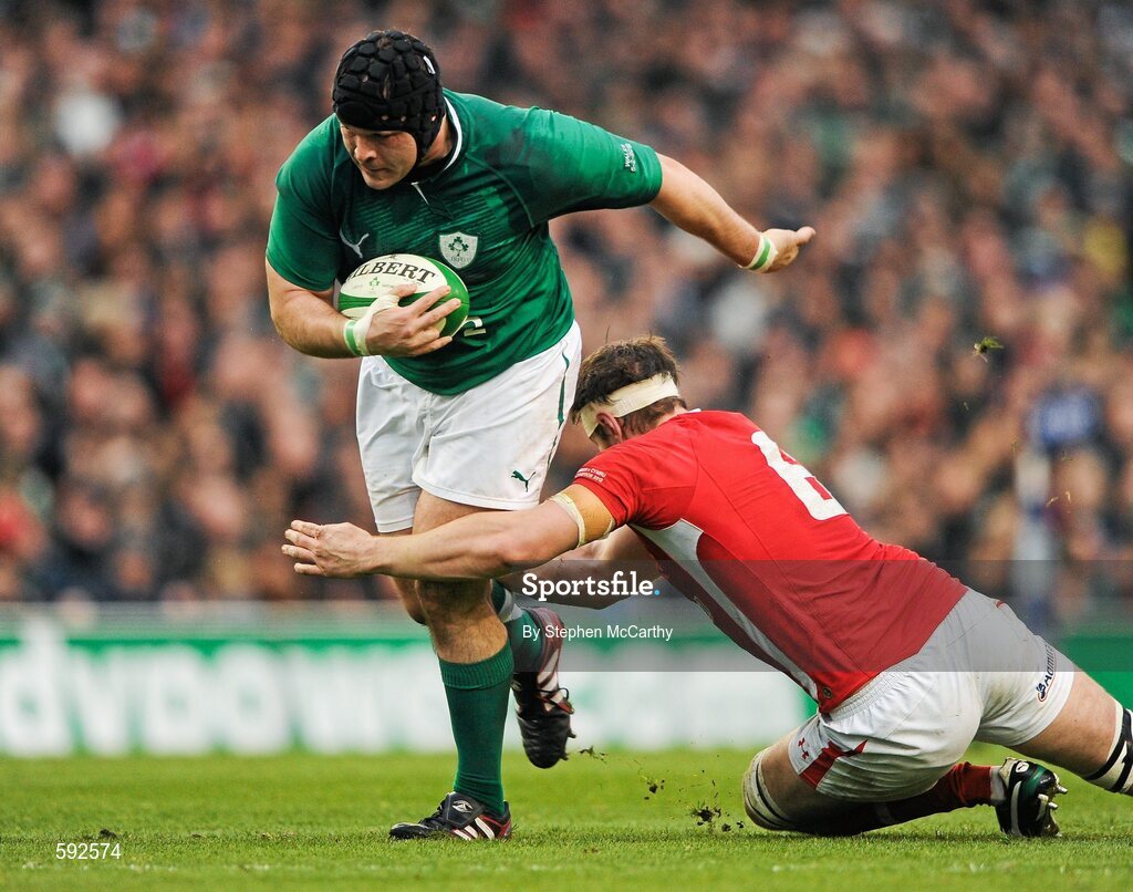 5 February 2012; Mike Ross, Ireland, is tackled by Ryan Jones, Wales. RBS Six Nations Rugby Championship, Ireland v Wales, Aviva Stadium, Lansdowne Road, Dublin. Picture credit: Stephen McCarthy / SPORTSFILE
