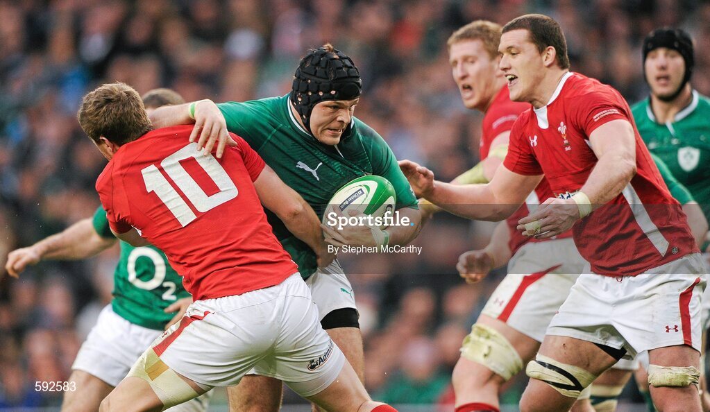 5 February 2012; Mike Ross, Ireland, is tackled by Rhys Priestland, Wales. RBS Six Nations Rugby Championship, Ireland v Wales, Aviva Stadium, Lansdowne Road, Dublin. Picture credit: Stephen McCarthy / SPORTSFILE