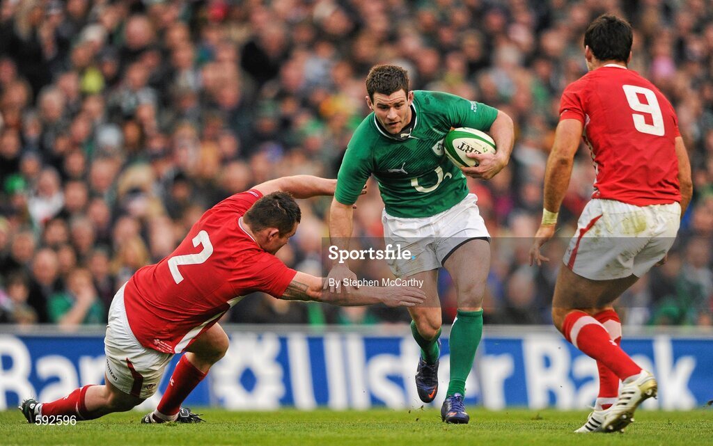 5 February 2012; Fergus McFadden, Ireland, is tackled by Huw Bennett, Wales. RBS Six Nations Rugby Championship, Ireland v Wales, Aviva Stadium, Lansdowne Road, Dublin. Picture credit: Stephen McCarthy / SPORTSFILE