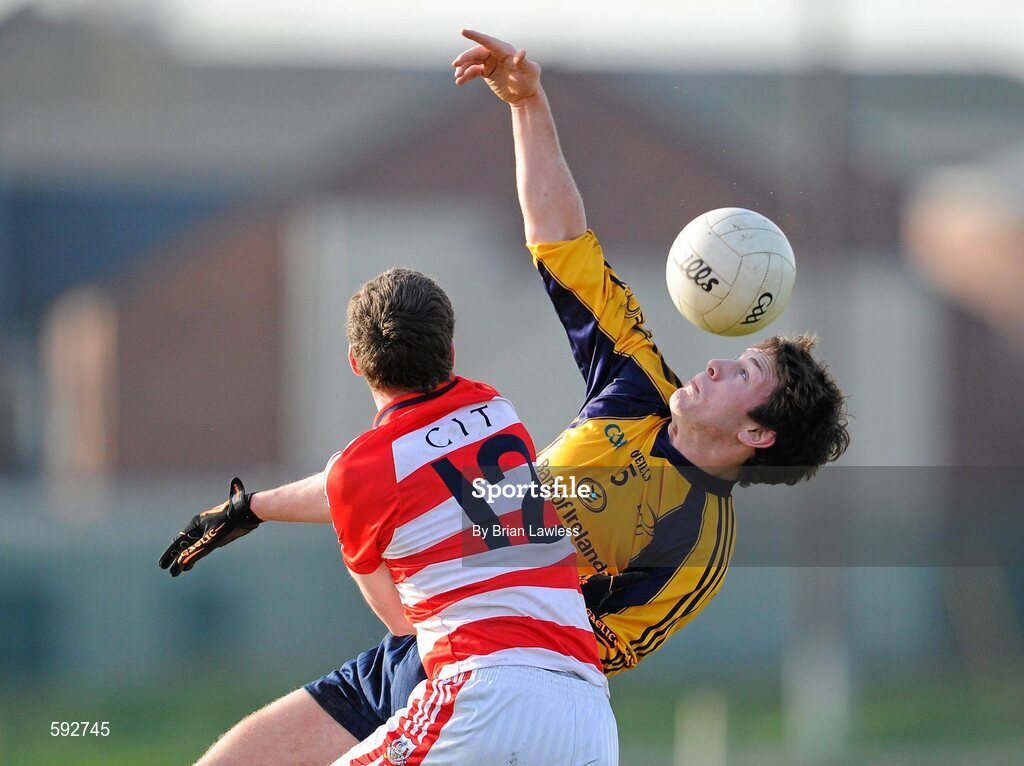 7 February 2012; Neil Collins, Dublin City University, in action against Jerry O'Connor, Cork Institute of Technology. Irish Daily Mail Sigerson Cup, Round 1, Dublin City University v Cork Institute of Technology, DCU Sportsgrounds, Ballymun, Dublin. Picture credit: Brian Lawless / SPORTSFILE