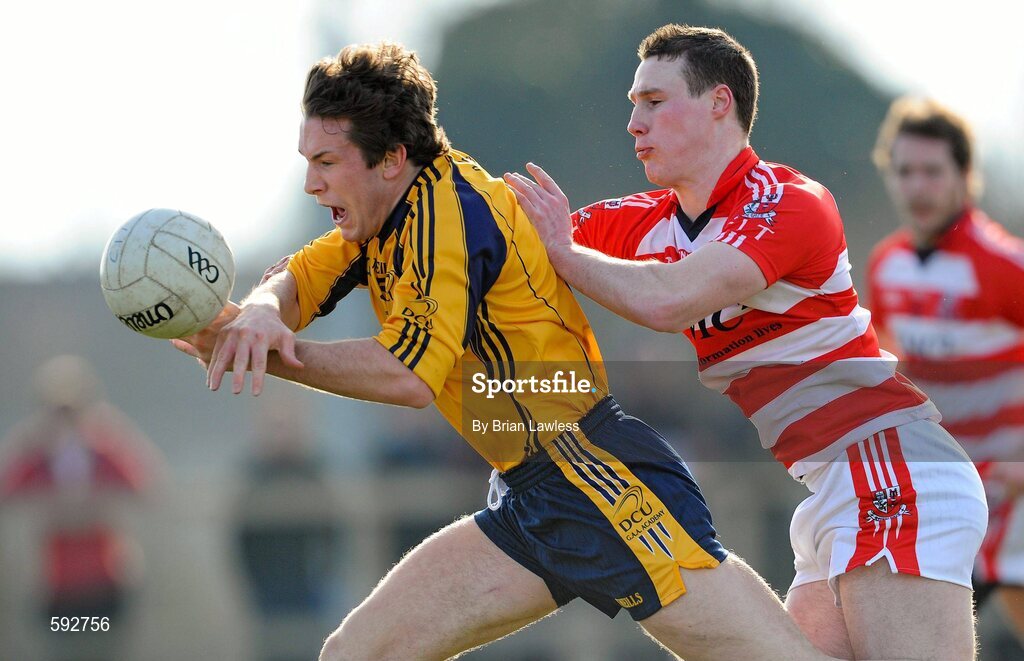 7 February 2012; Neil Collins, Dublin City University, in action against Mark Griffin, Cork Institute of Technology. Irish Daily Mail Sigerson Cup, Round 1, Dublin City University v Cork Institute of Technology, DCU Sportsgrounds, Ballymun, Dublin. Picture credit: Brian Lawless / SPORTSFILE