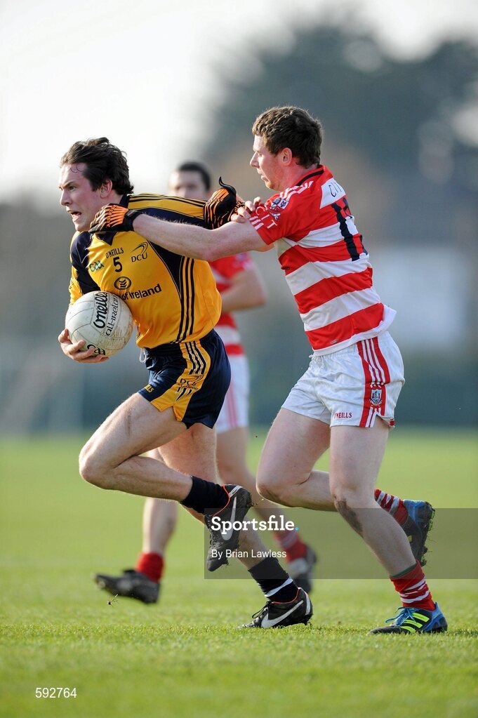 7 February 2012; Neil Collins, Dublin City University, in action against Jerry O'Connor, Cork Institute of Technology. Irish Daily Mail Sigerson Cup, Round 1, Dublin City University v Cork Institute of Technology, DCU Sportsgrounds, Ballymun, Dublin. Picture credit: Brian Lawless / SPORTSFILE
