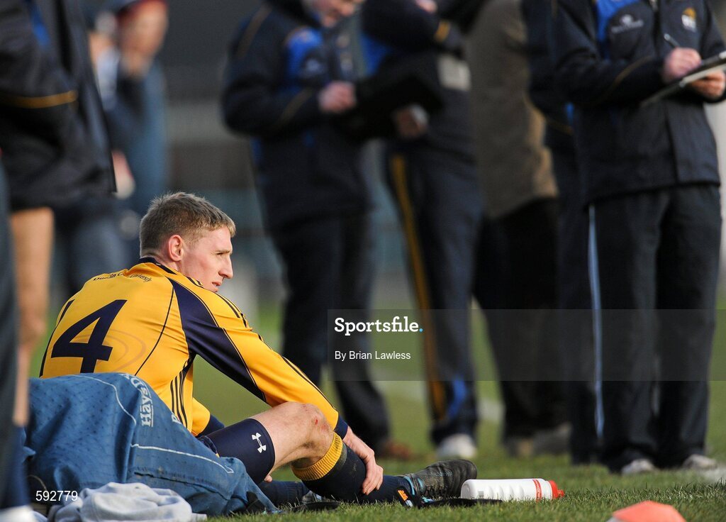 7 February 2012; Eoghan O'Gara, Dublin City University, watches from the sideline after he was sent off. Irish Daily Mail Sigerson Cup, Round 1, Dublin City University v Cork Institute of Technology, DCU Sportsgrounds, Ballymun, Dublin. Picture credit: Brian Lawless / SPORTSFILE