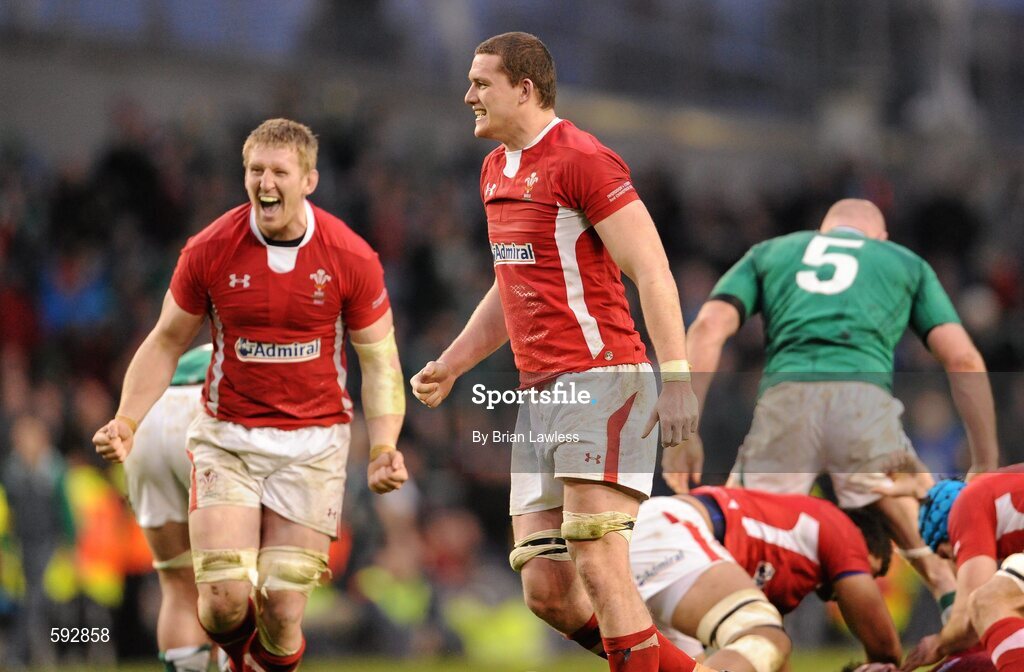 5 February 2012; Wales players Ian Evans and Bradley Davies, left, celebrate at the final whistle. RBS Six Nations Rugby Championship, Ireland v Wales, Aviva Stadium, Lansdowne Road, Dublin. Picture credit: Brian Lawless / SPORTSFILE