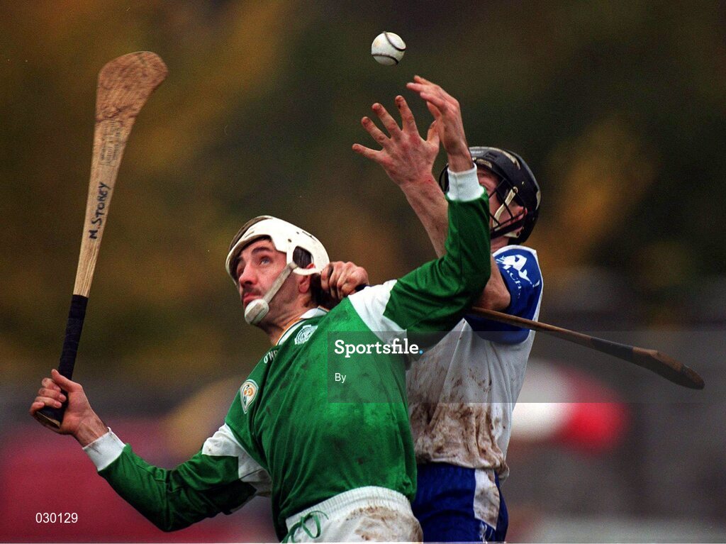 7 November 1999; Connaught's Noel Larkin reaches past Martin Storey, Leinster, to gain possession during the Railway Cup Interprovincial Hurling Championship at Birr, Co Offaly. Picture credit; Ray McManus/SPORTSFILE