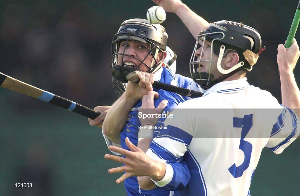 18 October 2003; Setanta O Hailpin, Munster, is tackled by Connacht's Diarmuid Cloonan, 3, and David Tierney. Railway Cup Semi-Final, Munster v Connacht, Gaelic Grounds, Limerick. Picture credit; Matt Browne / SPORTSFILE *EDI*