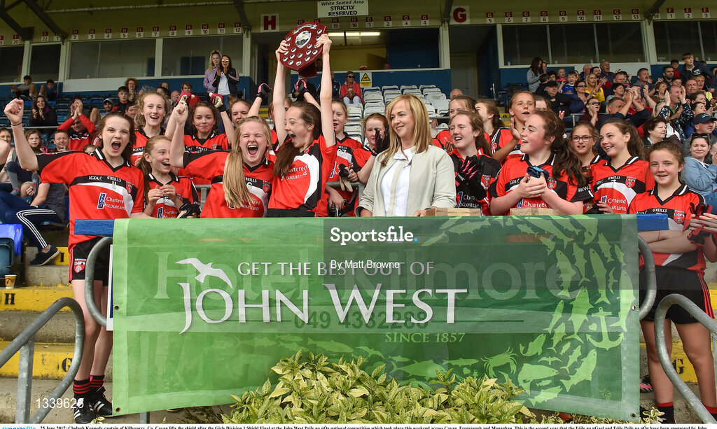 25 June 2017; Clodagh Kennedy captain of Killygarry, Co. Cavan lifts the shield after the Girls Division 1 Shield Final at the John West Peile na nÓg national competition which took place this weekend across Cavan, Fermanagh and Monaghan. This is the second year that the Féile na nGael and Féile Peile na nÓg have been sponsored by John West, one of the world’s leading suppliers of fish. The competition gives up-and-coming GAA superstars the chance to participate and play in their respective Féile tournament, at a level which suits their age, skills and strengths.   Photo by Matt Browne/Sportsfile