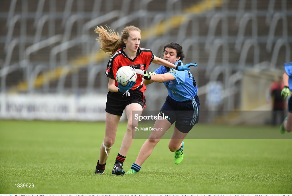 25 June 2017; Clodagh Kennedy of Killygarry, Co. Cavan in action against Saoirse Kellt of Westport, Co. Mayo during the Girls Division 1 Shield Final at the John West Peile na nÓg national competition which took place this weekend across Cavan, Fermanagh and Monaghan. This is the second year that the Féile na nGael and Féile Peile na nÓg have been sponsored by John West, one of the world’s leading suppliers of fish. The competition gives up-and-coming GAA superstars the chance to participate and play in their respective Féile tournament, at a level which suits their age, skills and strengths.   Photo by Matt Browne/Sportsfile