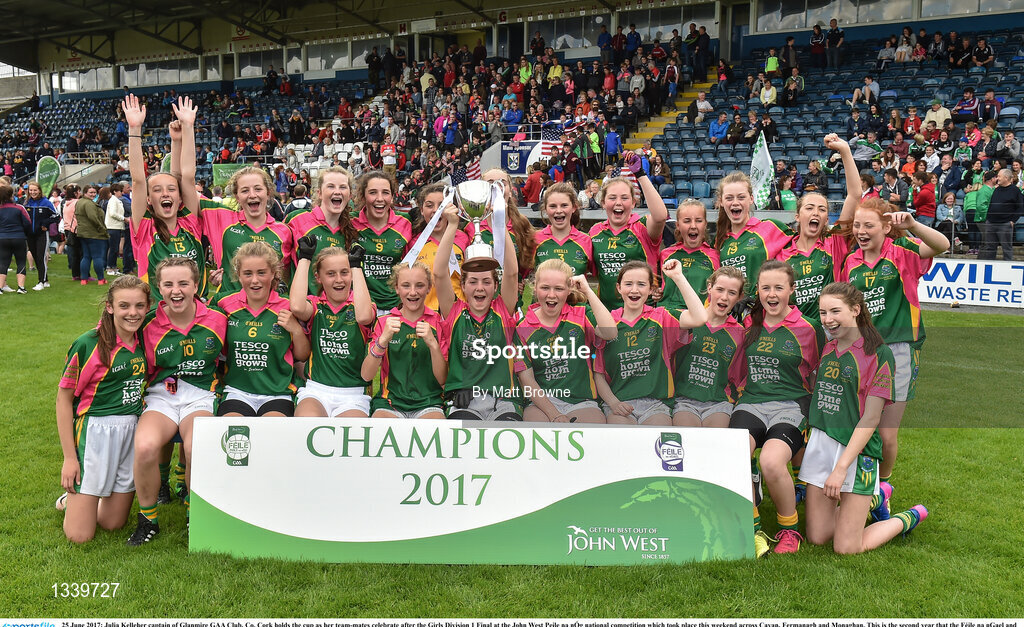 25 June 2017; Julia Kelleher captain of Glanmire GAA Club, Co. Cork holds the cup as her team-mates celebrate after the Girls Division 1 Final at the John West Peile na nÓg national competition which took place this weekend across Cavan, Fermanagh and Monaghan. This is the second year that the Féile na nGael and Féile Peile na nÓg have been sponsored by John West, one of the world’s leading suppliers of fish. The competition gives up-and-coming GAA superstars the chance to participate and play in their respective Féile tournament, at a level which suits their age, skills and strengths.   Photo by Matt Browne/Sportsfile