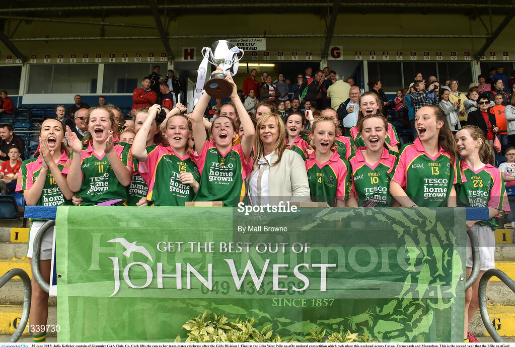25 June 2017; Julia Kelleher captain of Glanmire GAA Club, Co. Cork lifts the cup as her team-mates celebrate after the Girls Division 1 Final at the John West Peile na nÓg national competition which took place this weekend across Cavan, Fermanagh and Monaghan. This is the second year that the Féile na nGael and Féile Peile na nÓg have been sponsored by John West, one of the world’s leading suppliers of fish. The competition gives up-and-coming GAA superstars the chance to participate and play in their respective Féile tournament, at a level which suits their age, skills and strengths.   Photo by Matt Browne/Sportsfile