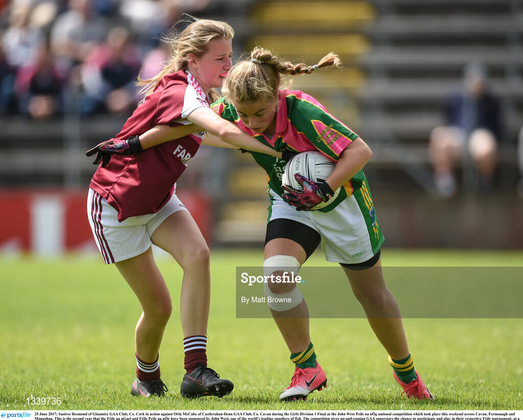 25 June 2017; Saoirse Desmond of Glanmire GAA Club, Co. Cork in action against Orla McCabe of Castlerahan-Denn GAA Club, Co. Cavan during the Girls Division 1 Final at the John West Peile na nÓg national competition which took place this weekend across Cavan, Fermanagh and Monaghan. This is the second year that the Féile na nGael and Féile Peile na nÓg have been sponsored by John West, one of the world’s leading suppliers of fish. The competition gives up-and-coming GAA superstars the chance to participate and play in their respective Féile tournament, at a level which suits their age, skills and strengths.   Photo by Matt Browne/Sportsfile