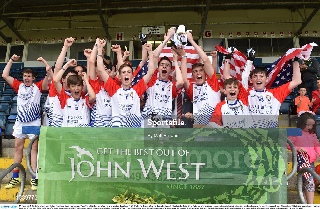 25 June 2017; Oisin Mathers and Brian Coughlan joint captain's of New York lift the cup after the win against Portlaois GAA Club, Co. Laois after the Boys Division 1 Final at the John West Peile na nÓg national competition which took place this weekend across Cavan, Fermanagh and Monaghan. This is the second year that the Féile na nGael and Féile Peile na nÓg have been sponsored by John West, one of the world’s leading suppliers of fish. The competition gives up-and-coming GAA superstars the chance to participate and play in their respective Féile tournament, at a level which suits their age, skills and strengths.   Photo by Matt Browne/Sportsfile