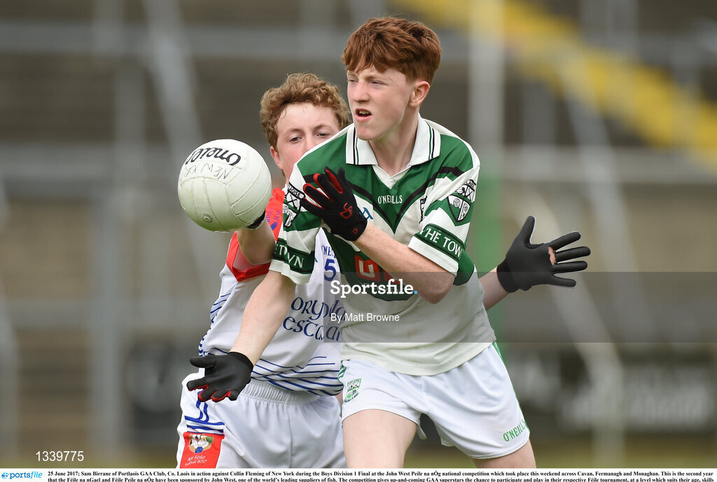 25 June 2017; Sam Birrane of Portlaois GAA Club, Co. Laois in action against Collin Fleming of New York during the Boys Division 1 Final at the John West Peile na nÓg national competition which took place this weekend across Cavan, Fermanagh and Monaghan. This is the second year that the Féile na nGael and Féile Peile na nÓg have been sponsored by John West, one of the world’s leading suppliers of fish. The competition gives up-and-coming GAA superstars the chance to participate and play in their respective Féile tournament, at a level which suits their age, skills and strengths.   Photo by Matt Browne/Sportsfile