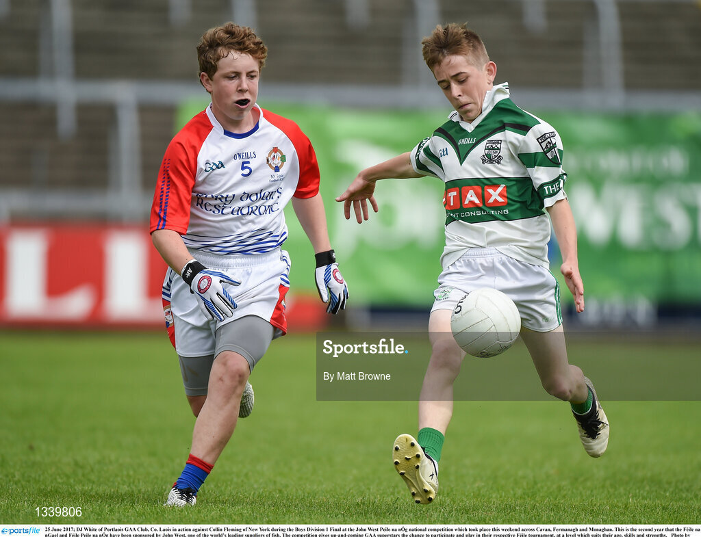 25 June 2017; DJ White of Portlaois GAA Club, Co. Laois in action against Collin Fleming of New York during the Boys Division 1 Final at the John West Peile na nÓg national competition which took place this weekend across Cavan, Fermanagh and Monaghan. This is the second year that the Féile na nGael and Féile Peile na nÓg have been sponsored by John West, one of the world’s leading suppliers of fish. The competition gives up-and-coming GAA superstars the chance to participate and play in their respective Féile tournament, at a level which suits their age, skills and strengths.   Photo by Matt Browne/Sportsfile