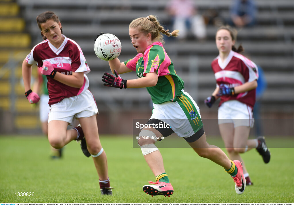 25 June 2017; Saoirse Desmond of Glanmire GAA Club, Co. Cork in action against Castlerahan-Denn GAA Club, Co. Cavan during the Girls Division 1 Final at the John West Peile na nÓg national competition which took place this weekend across Cavan, Fermanagh and Monaghan. This is the second year that the Féile na nGael and Féile Peile na nÓg have been sponsored by John West, one of the world’s leading suppliers of fish. The competition gives up-and-coming GAA superstars the chance to participate and play in their respective Féile tournament, at a level which suits their age, skills and strengths.   Photo by Matt Browne/Sportsfile