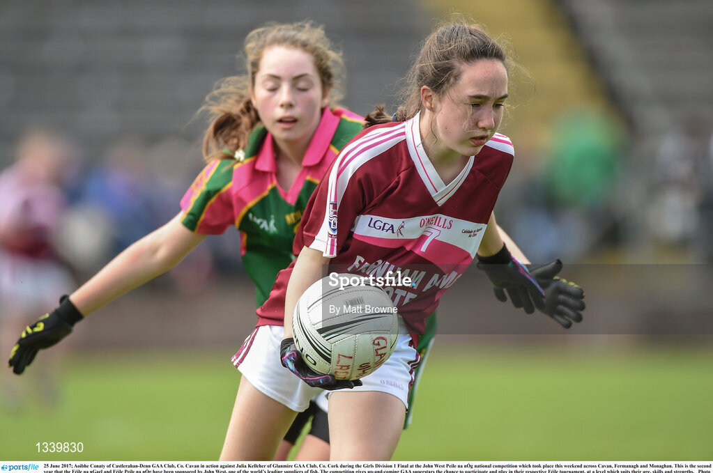25 June 2017; Aoibhe Conaty of Castlerahan-Denn GAA Club, Co. Cavan in action against Julia Kelleher of Glanmire GAA Club, Co. Cork during the Girls Division 1 Final at the John West Peile na nÓg national competition which took place this weekend across Cavan, Fermanagh and Monaghan. This is the second year that the Féile na nGael and Féile Peile na nÓg have been sponsored by John West, one of the world’s leading suppliers of fish. The competition gives up-and-coming GAA superstars the chance to participate and play in their respective Féile tournament, at a level which suits their age, skills and strengths.   Photo by Matt Browne/Sportsfile
