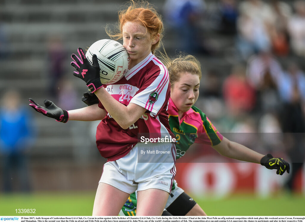25 June 2017; Aoife Keogan of Castlerahan-Denn GAA Club, Co. Cavan in action against Julia Kelleher of Glanmire GAA Club, Co. Cork during the Girls Division 1 Final at the John West Peile na nÓg national competition which took place this weekend across Cavan, Fermanagh and Monaghan. This is the second year that the Féile na nGael and Féile Peile na nÓg have been sponsored by John West, one of the world’s leading suppliers of fish. The competition gives up-and-coming GAA superstars the chance to participate and play in their respective Féile tournament, at a level which suits their age, skills and strengths. Photo by Matt Browne/Sportsfile