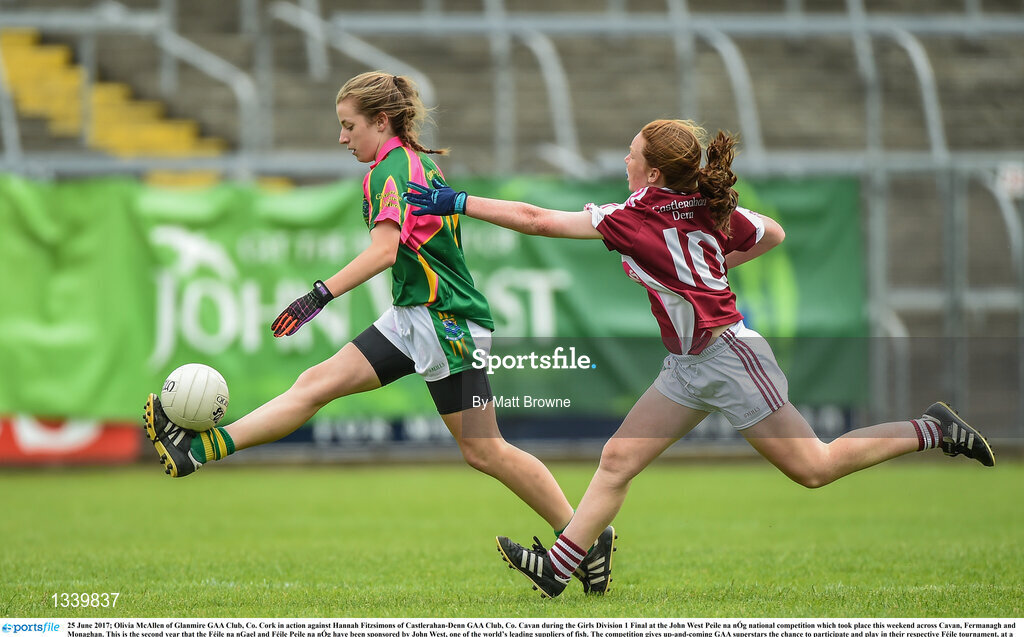 25 June 2017; Olivia McAllen of Glanmire GAA Club, Co. Cork in action against Hannah Fitzsimons of Castlerahan-Denn GAA Club, Co. Cavan during the Girls Division 1 Final at the John West Peile na nÓg national competition which took place this weekend across Cavan, Fermanagh and Monaghan. This is the second year that the Féile na nGael and Féile Peile na nÓg have been sponsored by John West, one of the world’s leading suppliers of fish. The competition gives up-and-coming GAA superstars the chance to participate and play in their respective Féile tournament, at a level which suits their age, skills and strengths.   Photo by Matt Browne/Sportsfile