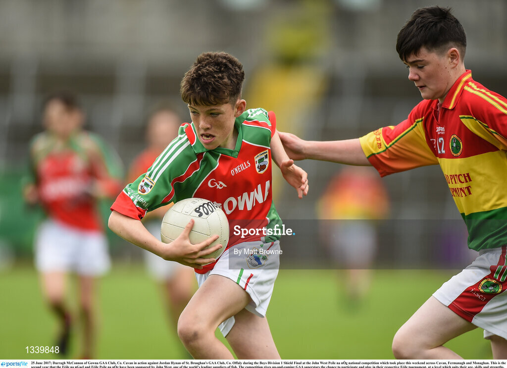25 June 2017; Darragh McConnon of Gowna GAA Club, Co. Cavan in action against Jordan Hynan of St. Broughan's GAA Club, Co. Offaly during the Boys Division 1 Shield Final at the John West Peile na nÓg national competition which took place this weekend across Cavan, Fermanagh and Monaghan. This is the second year that the Féile na nGael and Féile Peile na nÓg have been sponsored by John West, one of the world’s leading suppliers of fish. The competition gives up-and-coming GAA superstars the chance to participate and play in their respective Féile tournament, at a level which suits their age, skills and strengths.   Photo by Matt Browne/Sportsfile