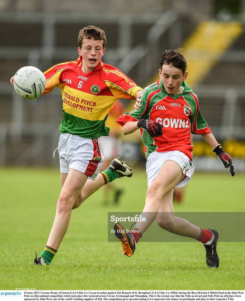 25 June 2017; Cormac Brady of Gowna GAA Club, Co. Cavan in action against Tim Bennett of St. Broughan's GAA Club, Co. Offaly during the Boys Division 1 Shield Final at the John West Peile na nÓg national competition which took place this weekend across Cavan, Fermanagh and Monaghan. This is the second year that the Féile na nGael and Féile Peile na nÓg have been sponsored by John West, one of the world’s leading suppliers of fish. The competition gives up-and-coming GAA superstars the chance to participate and play in their respective Féile tournament, at a level which suits their age, skills and strengths.   Photo by Matt Browne/Sportsfile