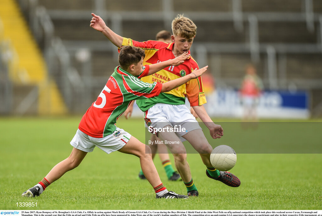 25 June 2017; Ryan Dempsey of St. Broughan's GAA Club, Co. Offaly in action against Mark Brady of Gowna GAA Club, Co. Cavan during the Boys Division 1 Shield Final at the John West Peile na nÓg national competition which took place this weekend across Cavan, Fermanagh and Monaghan. This is the second year that the Féile na nGael and Féile Peile na nÓg have been sponsored by John West, one of the world’s leading suppliers of fish. The competition gives up-and-coming GAA superstars the chance to participate and play in their respective Féile tournament, at a level which suits their age, skills and strengths.   Photo by Matt Browne/Sportsfile
