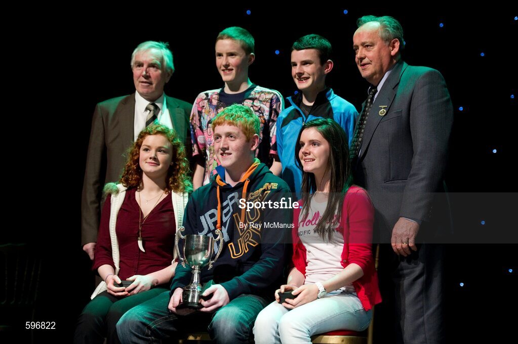 18 February 2012; The Ballydonoghue GAA Club, Co. Kerry, team, back row, left to right, Jason Foley, Kieran O'Connell, and front row, left to right, Cassandra Cremin, Kevin O'Neill, Myra O'Connellin with Des Maguire, back left, Cathaoirleach, Coiste Scór Naisúnta, and Paddy Naughton, back right, Cathaoirleach, Comhairle Connacht, after winning the 'Instrumental Music' competition during the All-Ireland Scór na nÓg Final 2012. Royal Theatre & Events Centre, Castlebar, Co. Mayo. Picture credit: Ray McManus / SPORTSFILE
