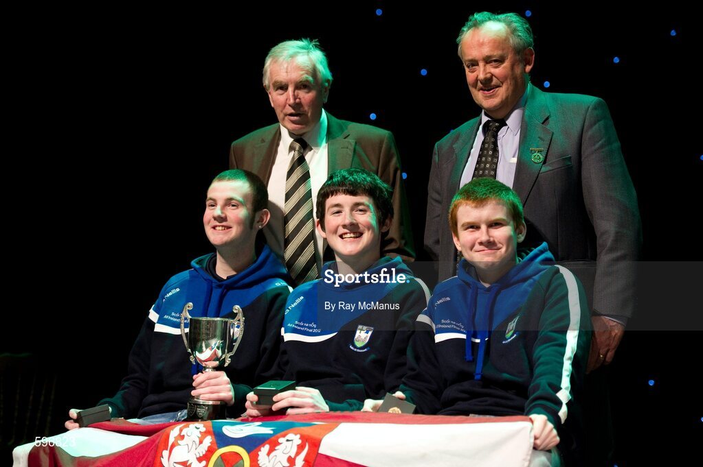 18 February 2012; The Ballycomoyle GAA Club, Co. Westmeath, team, left to right, Andrew Leahy, Killian Daly, Peter McKenna with Des Maguire, Cathaoirleach, Coiste Scór Naisúnta, right, and Paddy Naughton, Cathaoirleach, Comhairle Connacht, who won the Question Time' competition during the All-Ireland Scór na nÓg Final 2012. Royal Theatre & Events Centre, Castlebar, Co. Mayo. Picture credit: Ray McManus / SPORTSFILE
