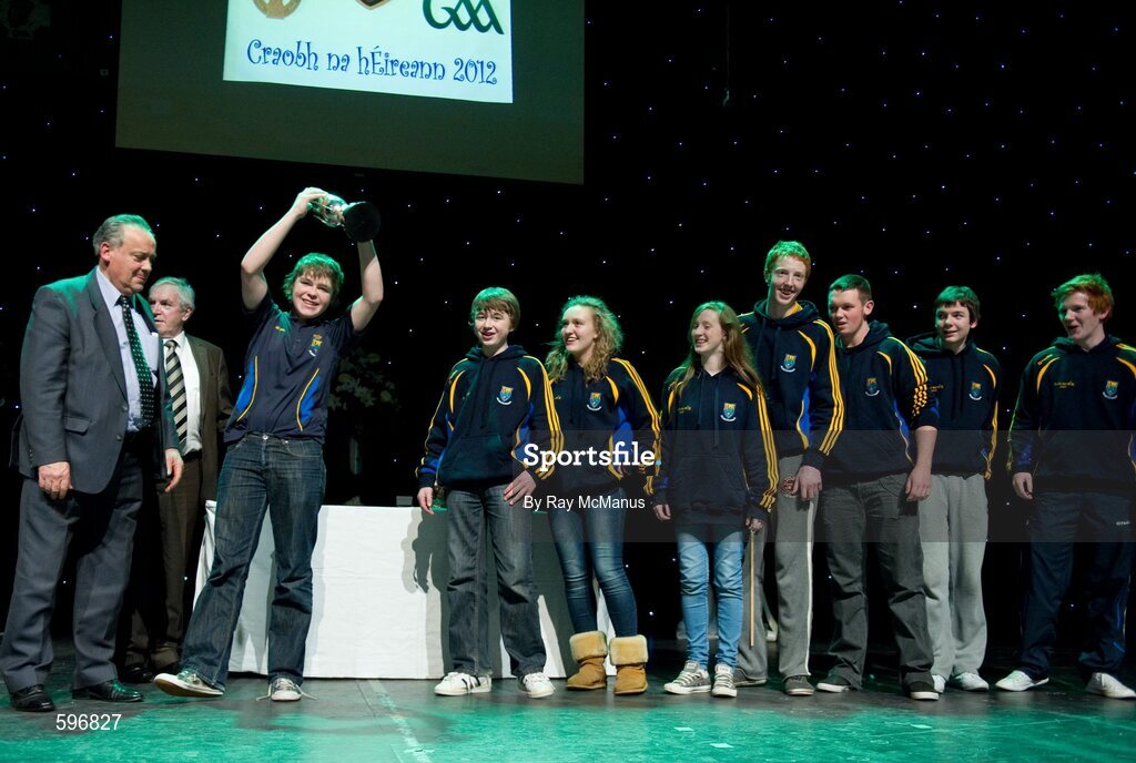 18 February 2012; The Carnew Emmetts GAA Club, Co. Wicklow, team including Bob Fitzgerald, Nathan O'Connor, Paul Murphy, Conor Lambert, Padraig Doran, Seamus Mulhall, Toni Doran, Anna Hennessy, with Paddy Naughton, left, Cathaoirleach, Comhairle Connacht, and Des Maguire, Cathaoirleach, Coiste Scór Naisúnta, after winning the 'Novelty Act' competition in the All-Ireland Scór na nÓg Final 2012. Royal Theatre & Events Centre, Castlebar, Co. Mayo. Picture credit: Ray McManus / SPORTSFILE