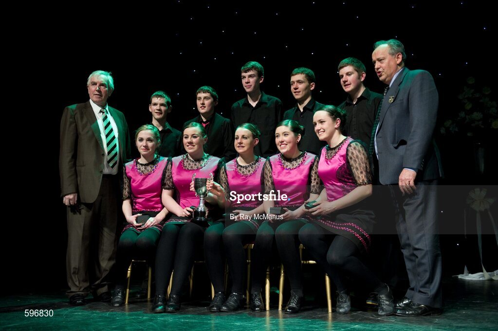 18 February 2012; The Boherbue GAA Club, Co. Cork, team, back row, left to right, Timothy Murphy, Michael Daly, Eddie Kiely, Jimmy Herlihy, Daniel Murphy, and front row, left to right, Louise Fitzgerald, Amée McCarthy, Evie Casey, Amanda O’Sullivan, Hannah O'Sullivan, with Paddy Naughton, right, back row, Cathaoirleach, Comhairle Connacht, and Des Maguire, left, back row, Cathaoirleach, Coiste Scór Naisúnta, after winning the 'Set Dancing' competition in the All-Ireland Scór na nÓg Final 2012. Royal Theatre & Events Centre, Castlebar, Co. Mayo. Picture credit: Ray McManus / SPORTSFILE