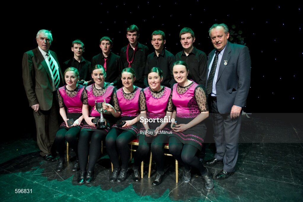 18 February 2012; The Boherbue GAA Club, Co. Cork, team, back row, left to right, Timothy Murphy, Michael Daly, Eddie Kiely, Jimmy Herlihy, Daniel Murphy, and front row, left to right, Louise Fitzgerald, Amée McCarthy, Evie Casey, Amanda O’Sullivan, Hannah O'Sullivan, with Paddy Naughton, right, back row, Cathaoirleach, Comhairle Connacht, and Des Maguire, left, back row, Cathaoirleach, Coiste Scór Naisúnta, after winning the 'Set Dancing' competition in the All-Ireland Scór na nÓg Final 2012. Royal Theatre & Events Centre, Castlebar, Co. Mayo. Picture credit: Ray McManus / SPORTSFILE