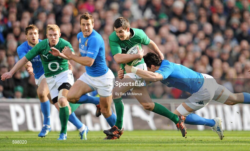 25 February 2012; Jonathan Sexton, Ireland, is tackled by Alessandro Zanni, Italy. RBS Six Nations Rugby Championship, Ireland v Italy, Aviva Stadium, Lansdowne Road, Dublin. Picture credit: Ray McManus / SPORTSFILE