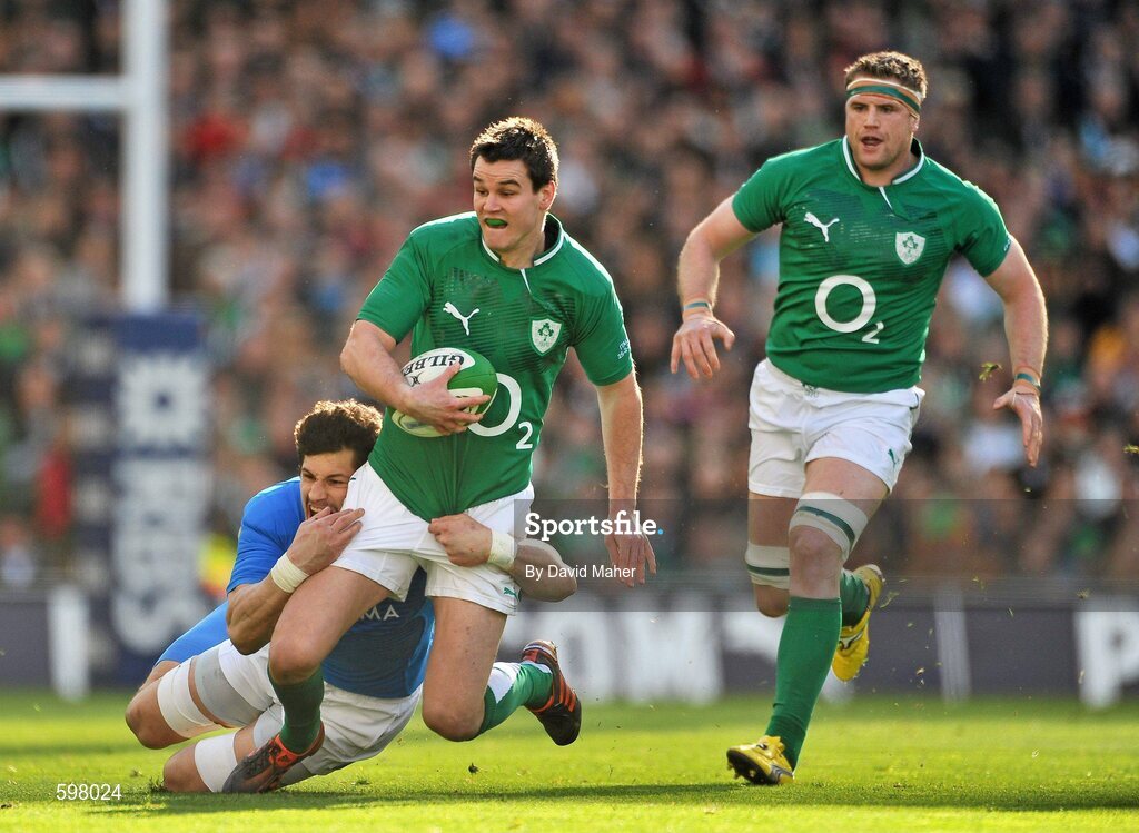 25 February 2012; Jonathan Sexton, Ireland, with support from team mate Jamie Heaslip, is tackled by Alessandro Zanni, Italy. RBS Six Nations Rugby Championship, Ireland v Italy, Aviva Stadium, Lansdowne Road, Dublin. Picture credit: David Maher / SPORTSFILE