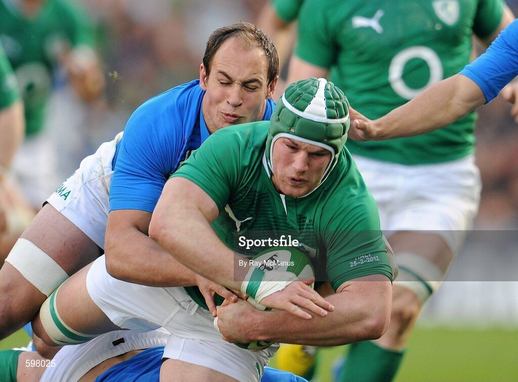 25 February 2012; Sean O'Brien, Ireland, is tackled by Sergio Parisse, Italy. RBS Six Nations Rugby Championship, Ireland v Italy, Aviva Stadium, Lansdowne Road, Dublin. Picture credit: Ray McManus / SPORTSFILE