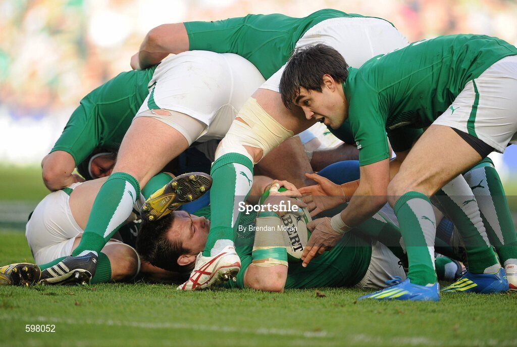 25 February 2012; Ireland prop Cian Healy, sets the ball up for scrum half Conor Murray. RBS Six Nations Rugby Championship, Ireland v Italy, Aviva Stadium, Lansdowne Road, Dublin. Picture credit: Brendan Moran / SPORTSFILE