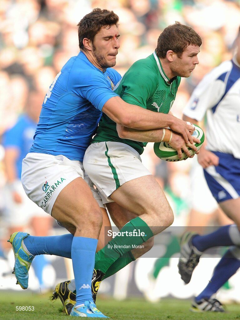 25 February 2012; Gordon D'Arcy, Ireland, is tackled by Giovanbattista Venditti, Italy. RBS Six Nations Rugby Championship, Ireland v Italy, Aviva Stadium, Lansdowne Road, Dublin. Picture credit: Brendan Moran / SPORTSFILE
