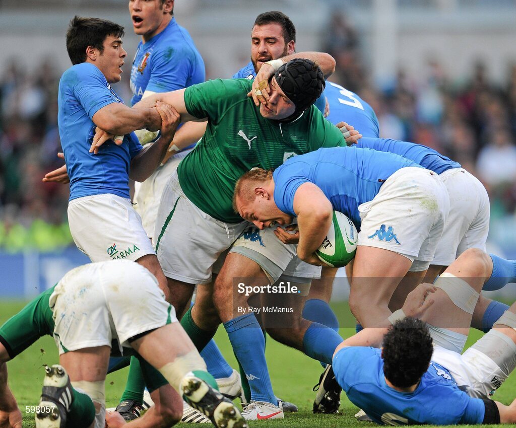 25 February 2012; Leonardo Ghiraldini, Italy, retains possession under pressure from Mike Ross, Ireland. RBS Six Nations Rugby Championship, Ireland v Italy, Aviva Stadium, Lansdowne Road, Dublin. Picture credit: Ray McManus / SPORTSFILE
