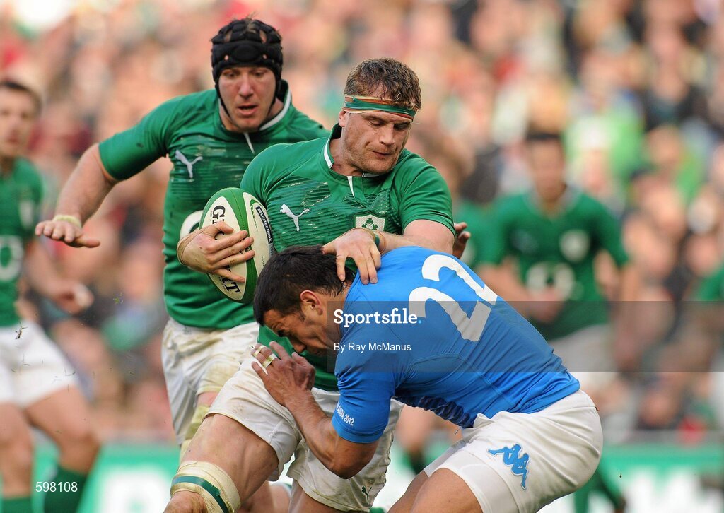 25 February 2012; Jamie Heaslip, Ireland, is tackled by Gonzalo Canale, Italy. RBS Six Nations Rugby Championship, Ireland v Italy, Aviva Stadium, Lansdowne Road, Dublin. Picture credit: Ray McManus / SPORTSFILE